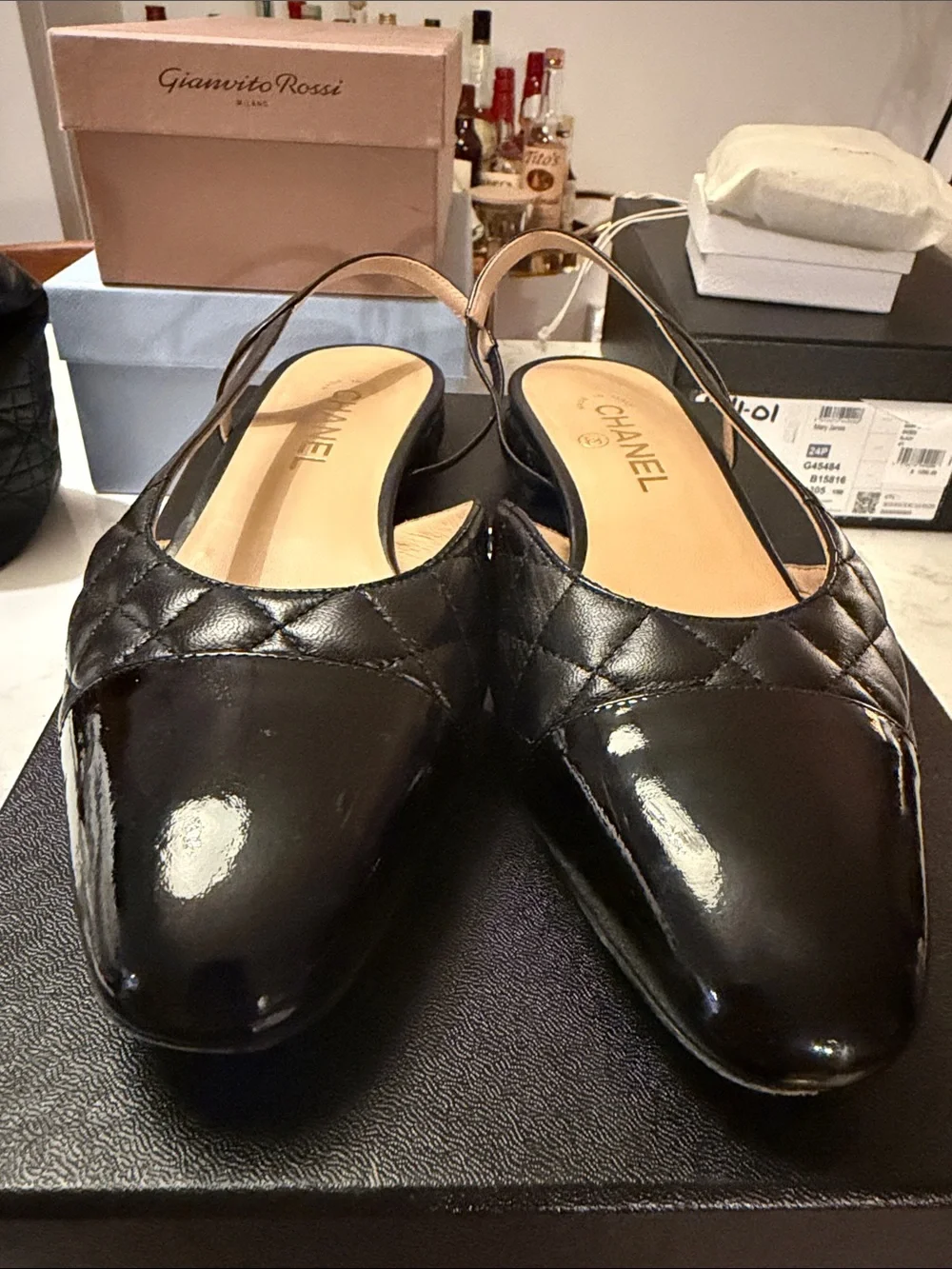 CHANEL Black Quilted Slingback Flats with Patent Leather Toe, sz 40.5